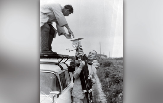 Person handing someone a bicycle