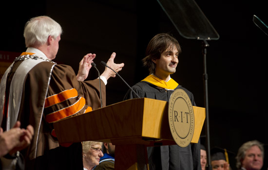 RIT President talking to students on stage