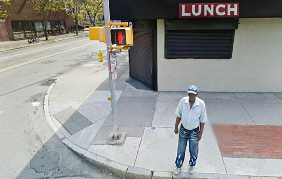 Person standing on street corner