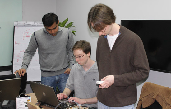 Students working on project at table