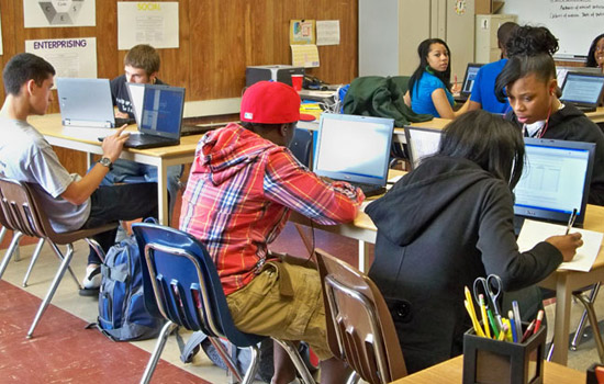 People working in classroom