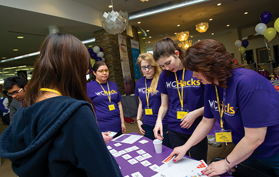 participants of even registering at table.