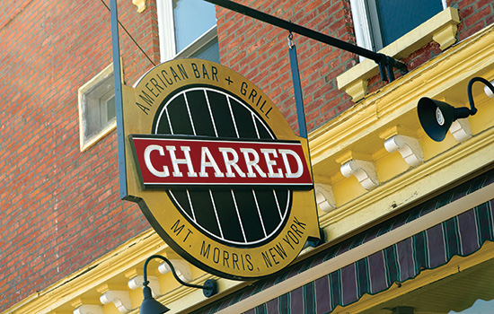Building sign for Charred restaurant