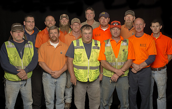 Group of people posing for camera