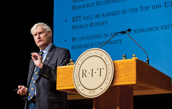 RIT President posing for camera