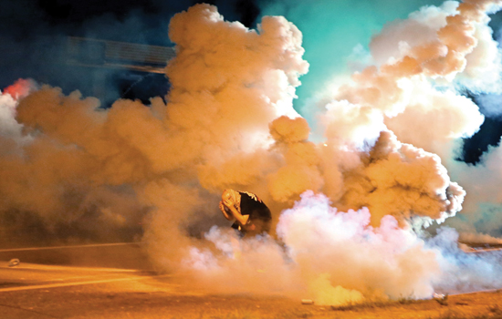 Person standing in smoke