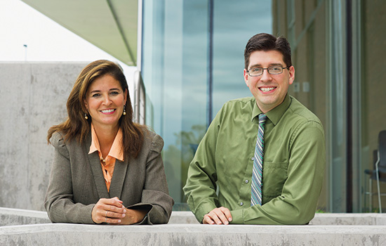 two health professors pose for photo.