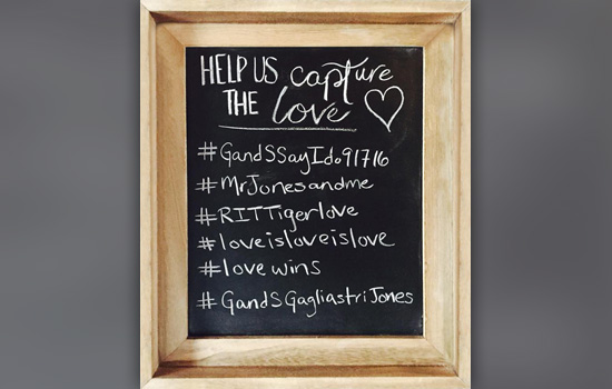 Blackboard displaying Help us Capture the Love