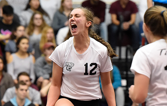  action shot of Sarah Szybist in Volleyball uniform.