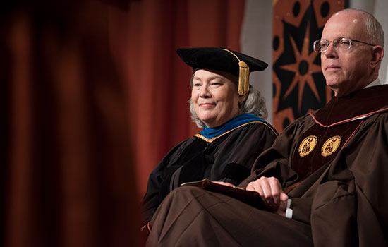 Provost Ellen Granberg and President Munson sitting together at convocation.